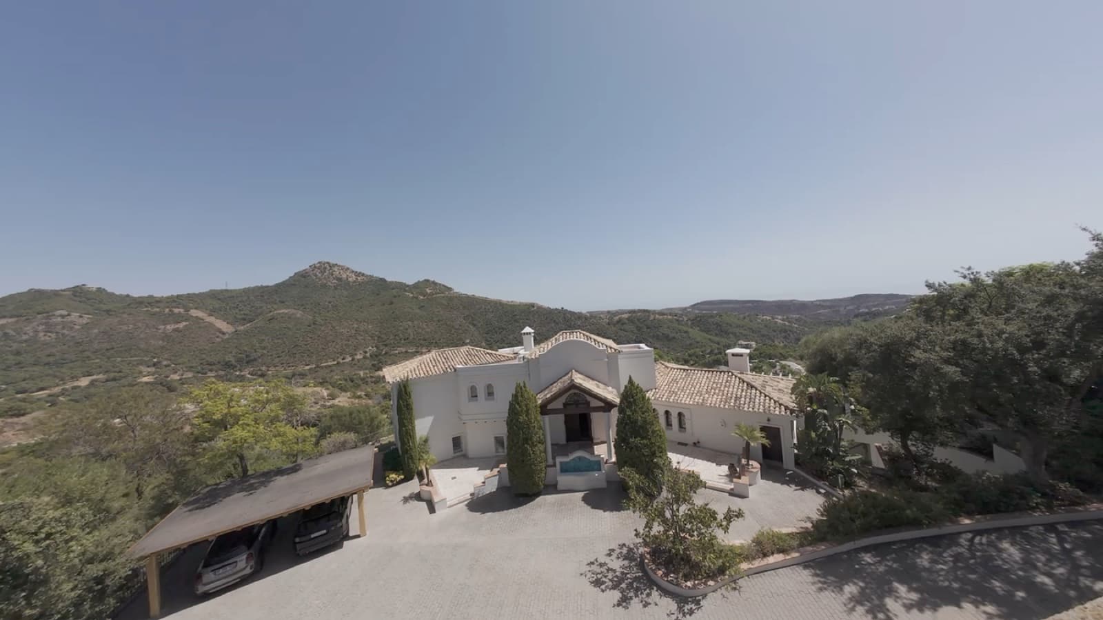 FPV tour of Villa Benahavís: exterior approach, then a flight through the rooms out to the terrace